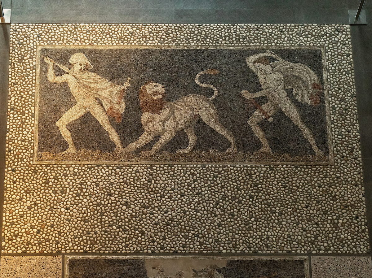 Alexander the Great and Craterus hunting a lion in Pella. This mosaic is based on a sculptural group that Craterus' son commissioned from Lysippus