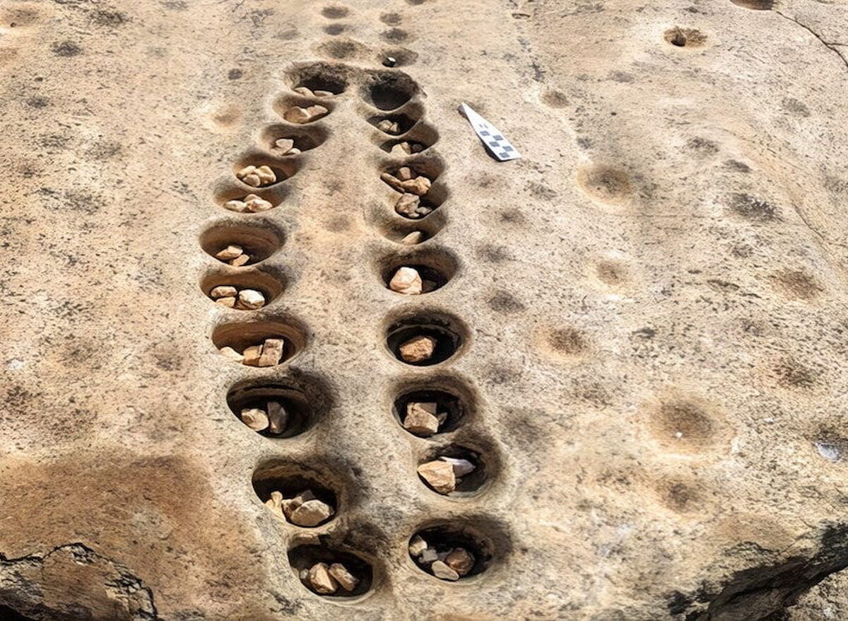 During a trip to the Lewa nature reserve in central Kenya, Yale's Veronica Waweruit observed rows of shallow wells drilled into a rocky outcrop, where she believes ancient villagers played a version of the game Mancala, a two-player strategy board game still played around the world