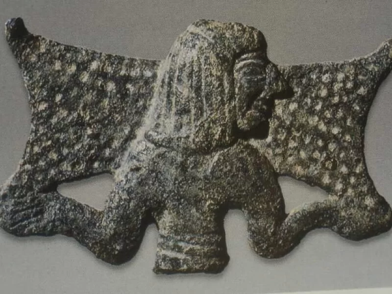 Bearer of a Cypriot 'ox skin' ingot (12th century B.C.) in the Royal Ontario Museum