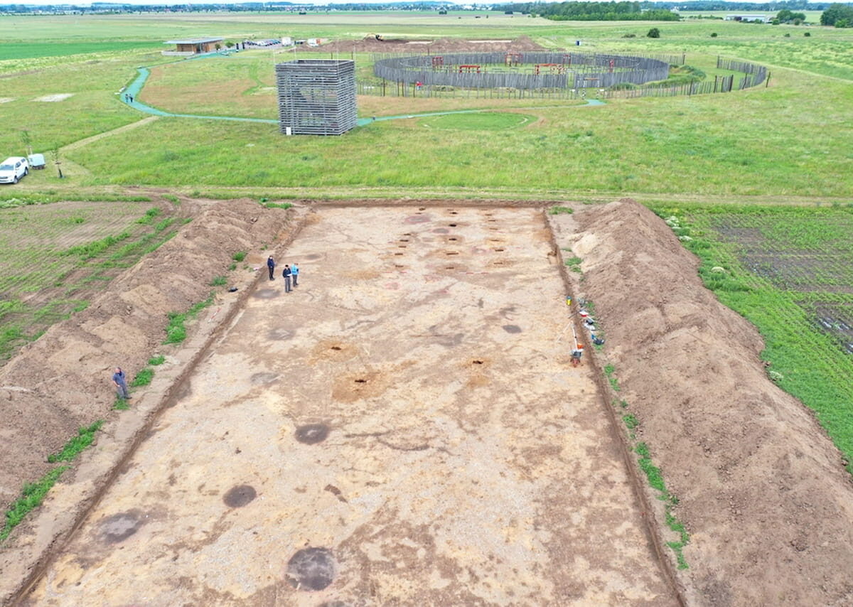 The largest of the three recently discovered house plans of the Bell Beaker culture (between 2450 and 2250 B.C.) with the circular sanctuary in the background, facing west.